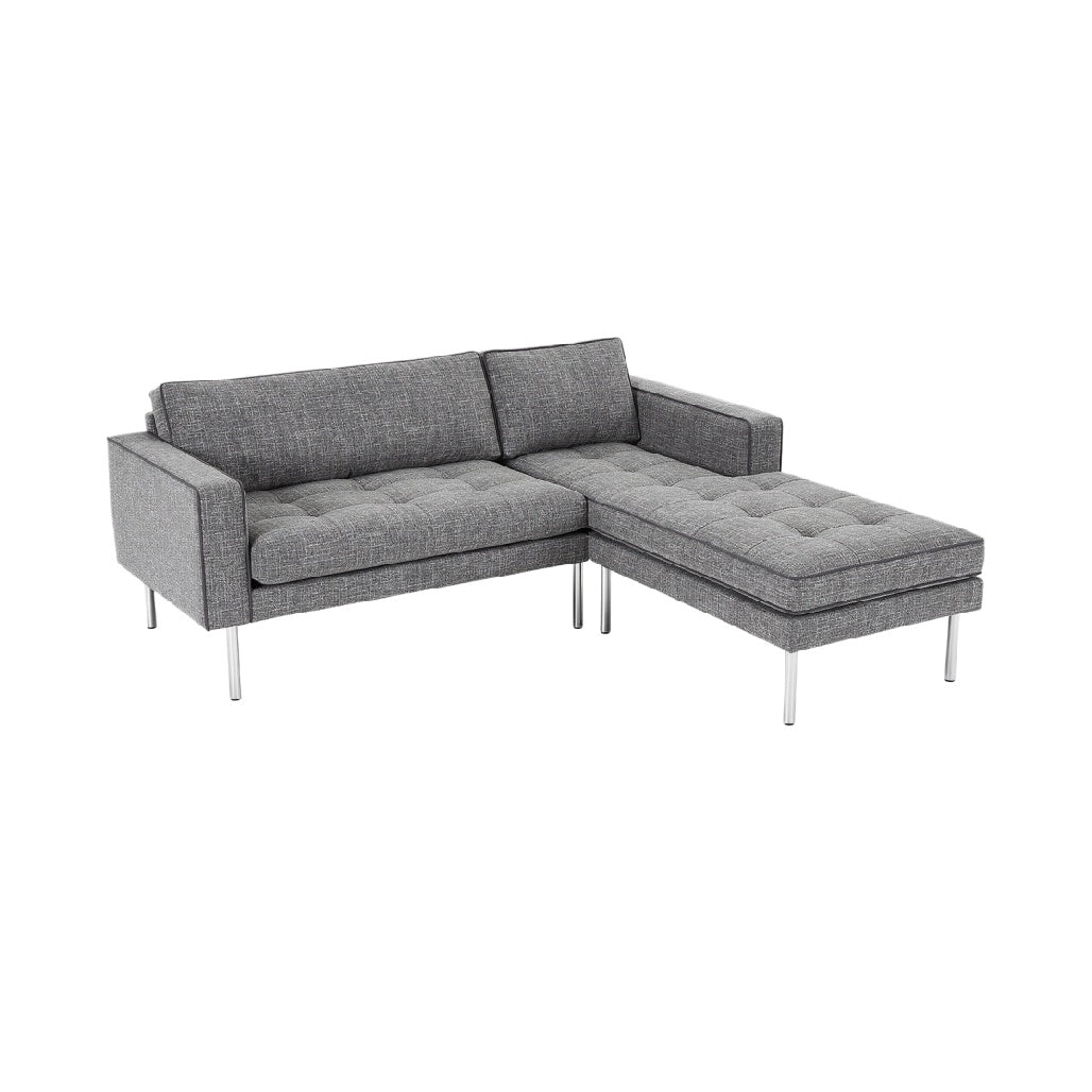 Sofa narożna z szarym materiałem i metalowymi nogami